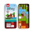 Set de 38 cubos magnéticos para viaje con caja metálica organizadora abierta y bloques pixelados estilo Minecraft.