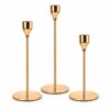 Set de 3 candelabros dorados metálicos de diferentes alturas para decoración